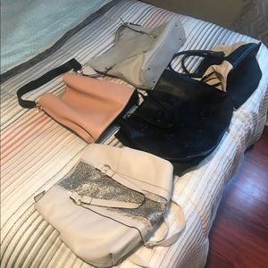 Bundle of woman handbags